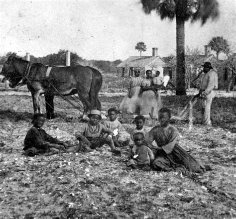 Florida Memory • View showing African American family at the Kingsley Plantation on Fort George ...