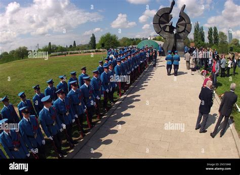 A Serbian Military Honor Guard Pay Homage To The Victims Of The