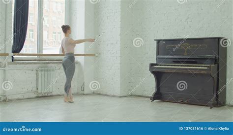 Ballerina Performing Battement Tendu Jete Exercise Stock Footage