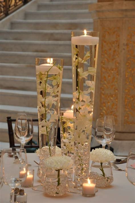 Submerged Orchid Stems With Tall Vase Centerpieces Wedding