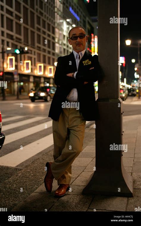 Mature Man Leaning Against Pillar Stock Photo Alamy