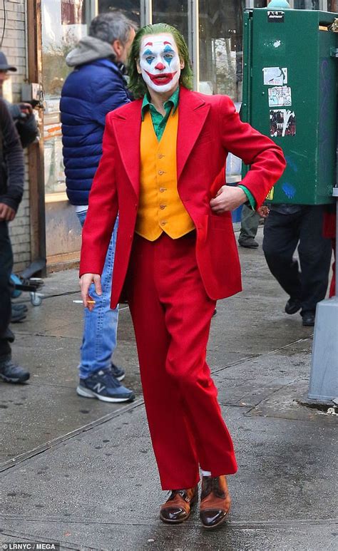 Joaquin Phoenix Sports Full Clown Prince Of Crime Makeup And Costume As