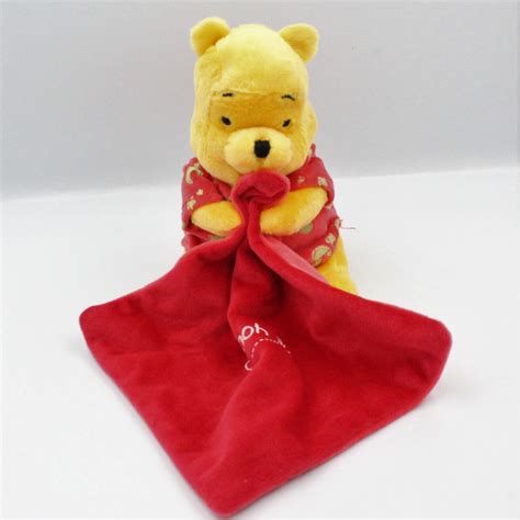 Doudou Luminescent Winnie L Ourson Mouchoir Rouge Disney