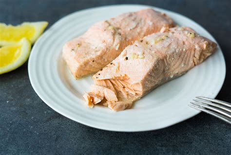 How To Make Simple Baked Salmon Fillet With Garlic And Lemon Recipe Simple Baked Salmon