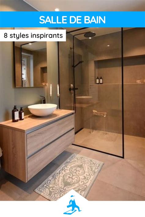 A Bathroom With A Sink Mirror And Shower Stall