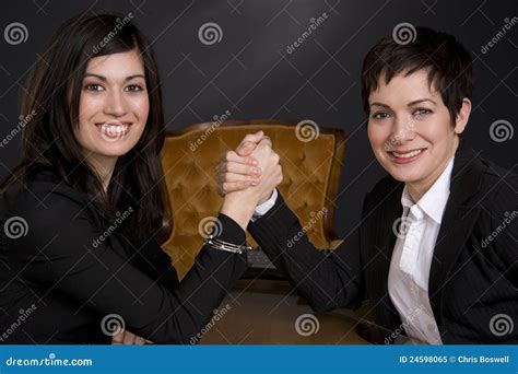 Two Attractive Business Women Arm Wrestling Stock Image - Image: 24598065