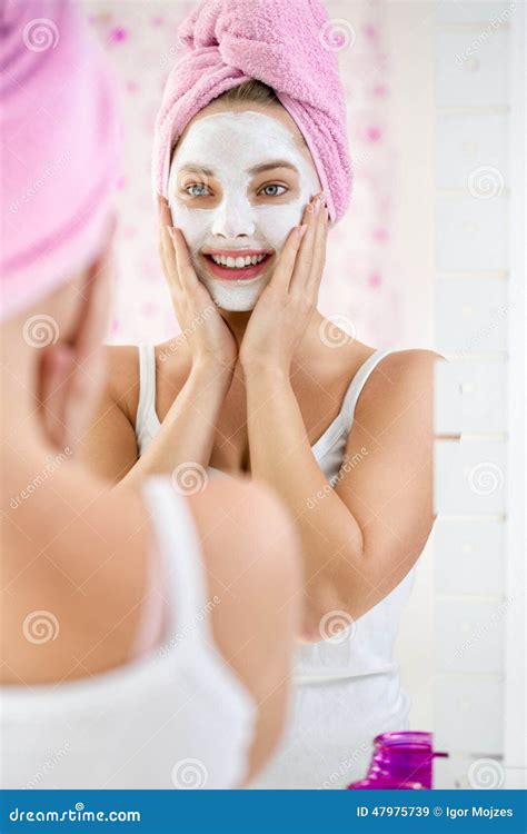 Young Woman Applying Facial Cleansing Mask Stock Image Image Of