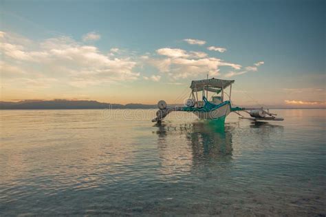 Traditional Filipino Boat Known As A Banca Or Bangka Is Anchored On