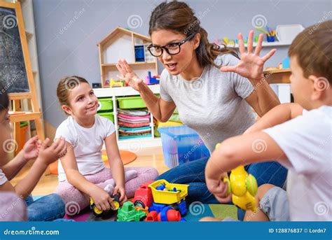 Preschool Kids And Teacher