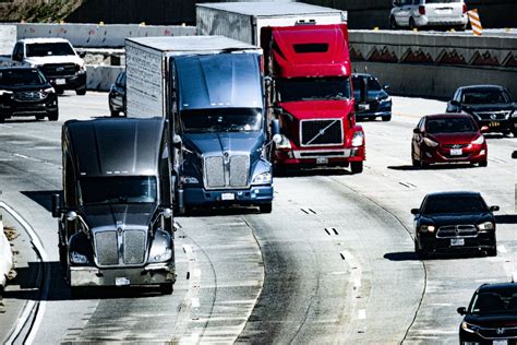 Trucks and Cars on a Highway · Free Stock Photo