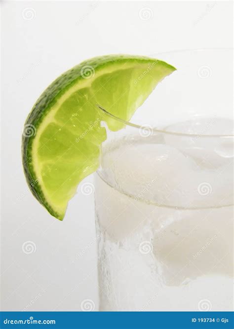 Lime Wedge In Glass Stock Images - Image: 193734