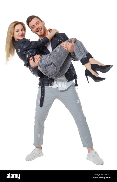 A Man Is Holding A Woman In His Arms Smiling Couple Front View The