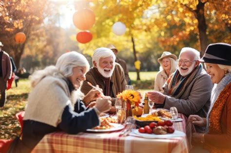 Premium Ai Image Group Of Seniors Enjoying A Thanksgiving Picnic In A