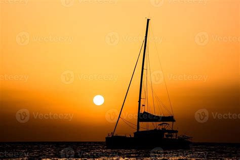 Sailing yacht at sunset 22326873 Stock Photo at Vecteezy