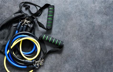 Sports Accessories - an Expander with a Carbine on a Black Background ...