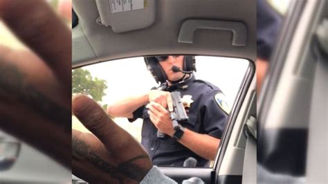 California Police Officer Points Gun At Passengers During Traffic Stop