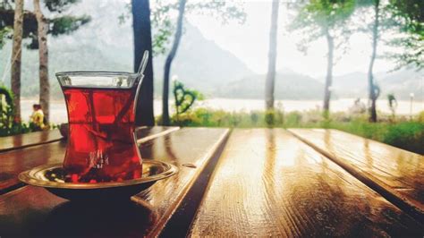 Premium Photo | Glass of tea on table