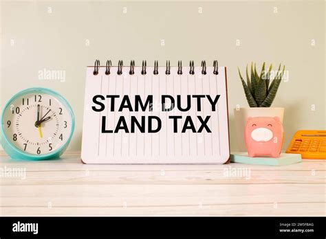 SDLT Stamp Duty Land Tax Write On A Card On Office Desk Stock Photo