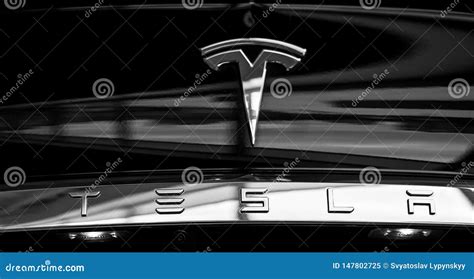 Tesla Emblem on Black Car. Close-Up Silver Logo Editorial Image - Image ...