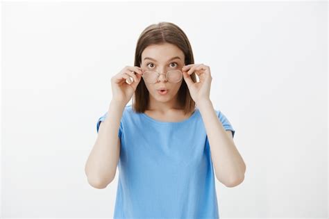 Free Photo Confused And Shocked Woman Take Off Glasses Stare Amazed