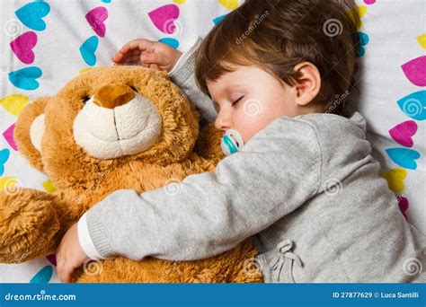 Child Sleeping with Teddy Bear Stock Image - Image of green, serene ...