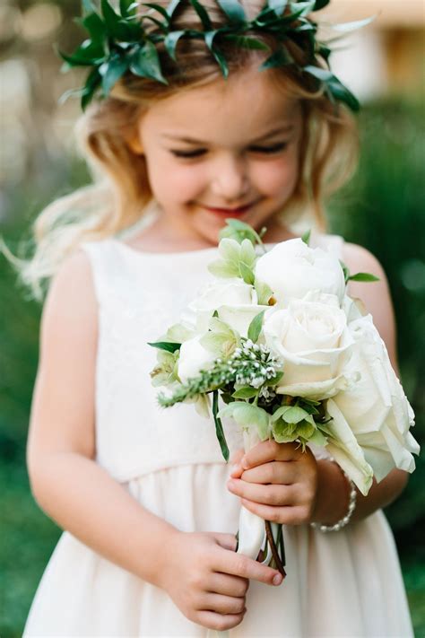 Flower Girl Holding Rose Bouquet