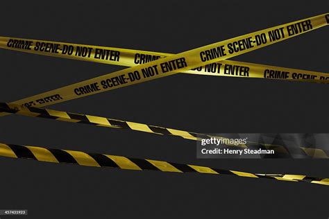 Crime Scene Tape High Res Stock Photo Getty Images