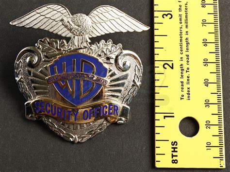 Warner Bros. Security Hat Badge | Prop Store - Ultimate Movie Collectables