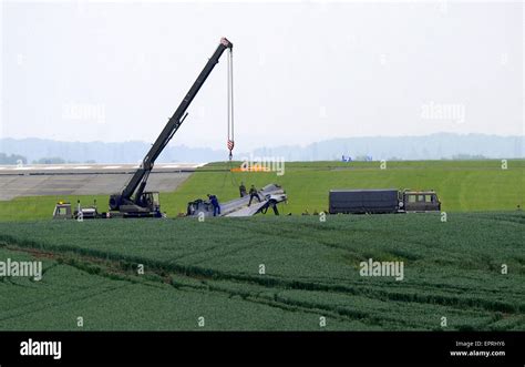 A crashed JAS-39 Gripen fighter of the Hungarian military was moved ...