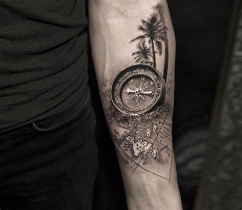 Compass and map tattoo by Niki Norberg | Photo 31893