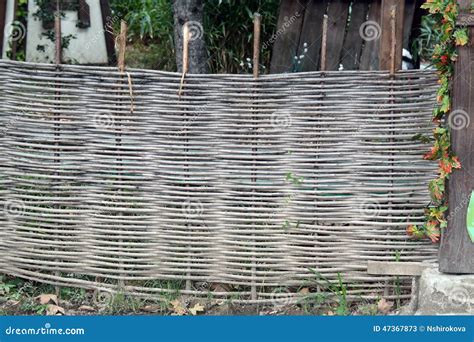 Wicker Fencing with High Road Stock Image - Image of wicket, fence: 47367873