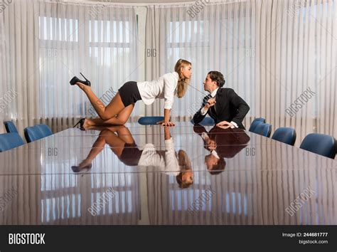 Sexy Female On Meeting Room Desk And Man In Suit Bdsm Sado Maso