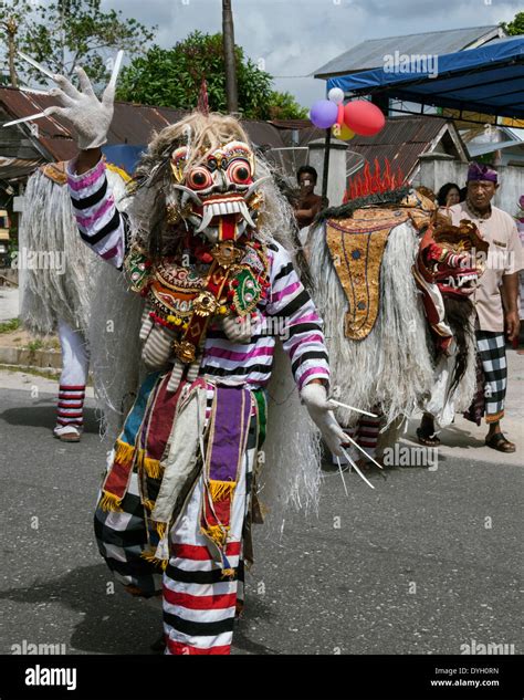 Lion dancer with long nails, Belitung Island, Indonesia Stock Photo - Alamy