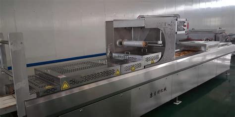 Thermoforming Vacuum Skin Packaging Machine KANGBEITE PACKAGING