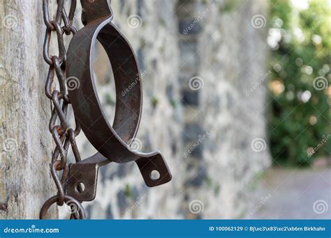 Medieval Prison Chains for Prisoners in Front of Stone Wall Stock Image ...