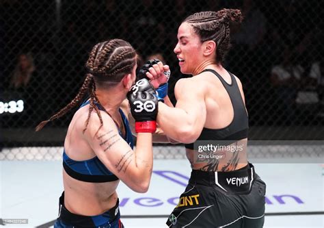 Norma Dumont Of Brazil Punches Karol Rosa Of Brazil In A News Photo