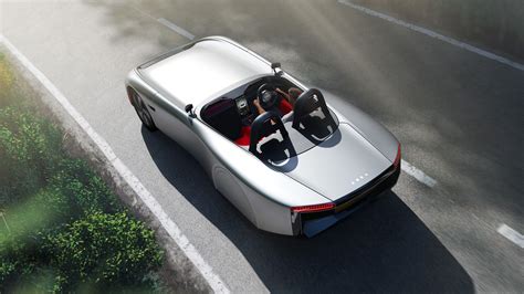 This is a two-seater fully electric sports car concept called Aura ...