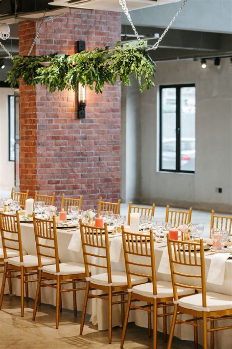 Viking Style Table Set-up with Gold Chiavari Chairs, with Greenery Garland