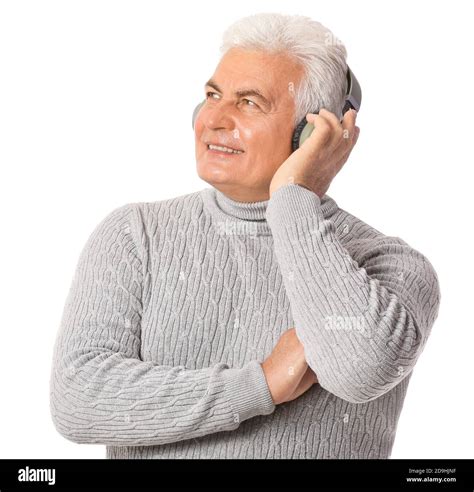 Mature Man Listening To Music On White Background Stock Photo Alamy