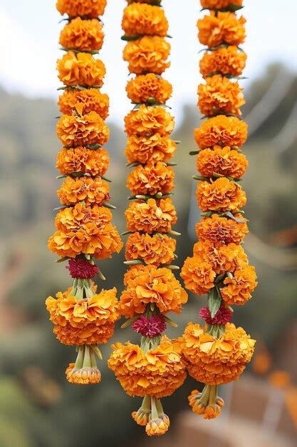 Premium Photo Traditional Indian Floral Garland Toran Made Of Marigold Flowers And Mango Leaves