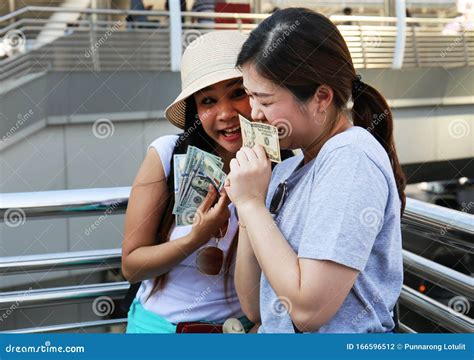 Beautiful Girl Is Happy When Receiving Bonuses For Traveling At The End