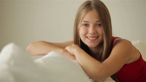 Beautiful Girl Relaxing On Couch Smiling At Camera Youtube