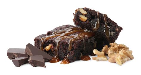 Delicious Chocolate Brownies with Nuts and Caramel Sauce on White ...