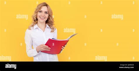 Happy Blonde Businesswoman Woman In White Shirt Making Notes In Notepad Or Notebook Student