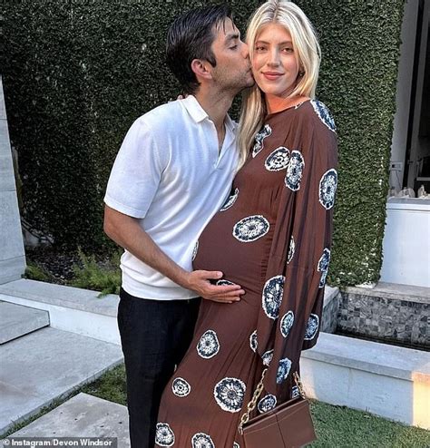 Pregnant Devon Windsor Cradles Her Bump While Dancing In A Red Bikini Daily Mail Online