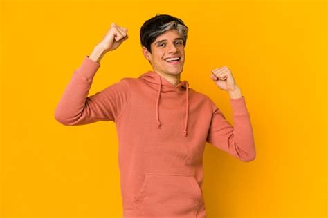 Premium Photo Young Skinny Hispanic Man Cheering Carefree And Excited