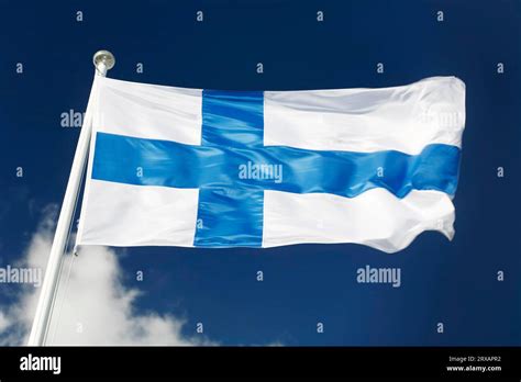 The National Flag Of Finland Waving In The Wind Stock Photo Alamy