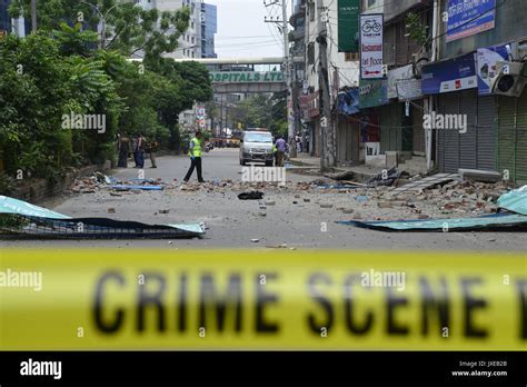 Dhaka, Bangladesh. 15th Aug, 2017. Bangladeshi crime scene investigators collect evidence from a ...