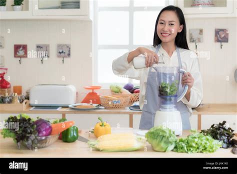 Vegetable Smoothie Asian Woman Making Green Smoothies With Blender