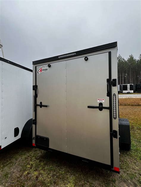 By Enclosed Trailer Collins Custom Cargo